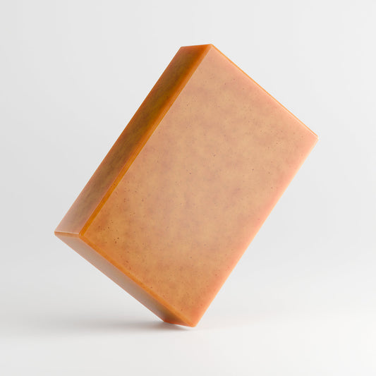 Kojic acid and turmeric brightening soap bar for even skin tone and clarity.